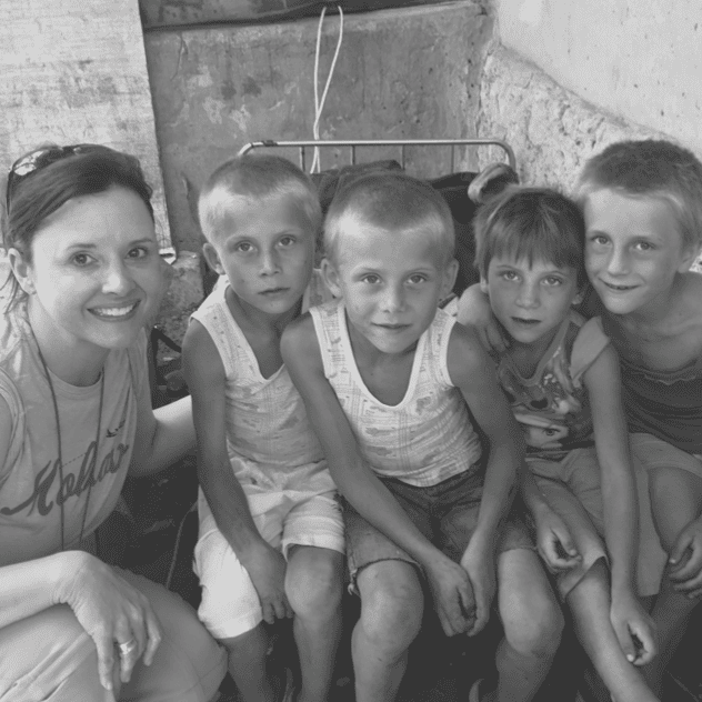 Children and a woman sitting together at Rolling Hills Community Church.